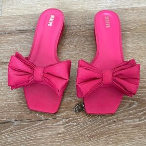 Maeve Fuchsia Bow Slide Sandals